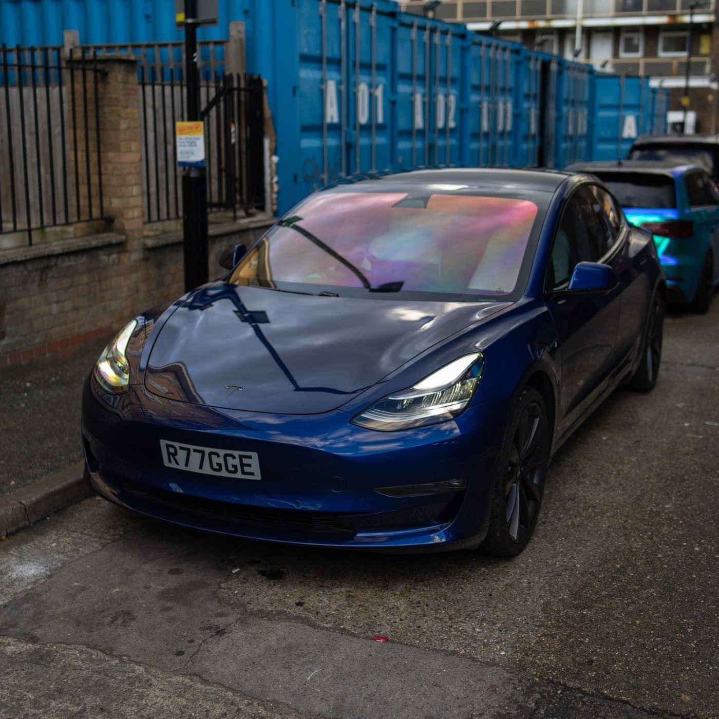 Tesla Model 3 with a chameleon windscreen tint by London Tint Studio
